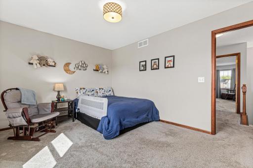 Bedroom 3 of 4 on upper level. 5 Total bedrooms!