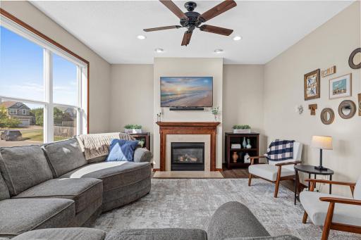 Oversized windows and gas fireplace make this a warm and welcoming spot to enjoy all year long