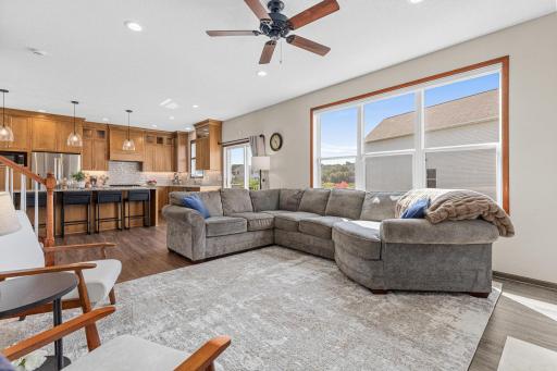 Oversized windows and gas fireplace make this a warm and welcoming spot to enjoy all year long