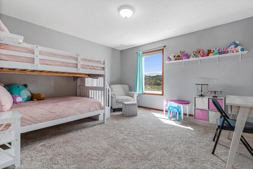 Bedroom 2 of 4 on upper level. 5 Total bedrooms!