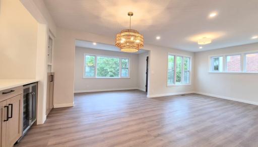 Big Open Area with Sunroom, Dining Room & Living Room