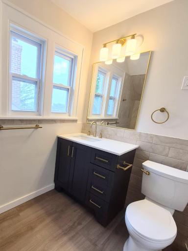 Burnished Gold Accents in Upper Bathroom