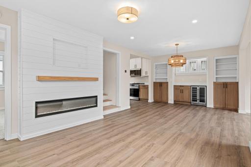 Custom Fireplace with TV Bracket Inset & Dry Bar Area off the Dining Room