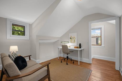 A convenient loft area in the upper level provides additional, flexible space for a home office and/or sitting area