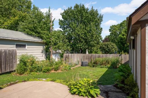 This home features beautiful natural landscaping and gardens, including a vegetable garden in the backyard and a patio for relaxing or entertaining
