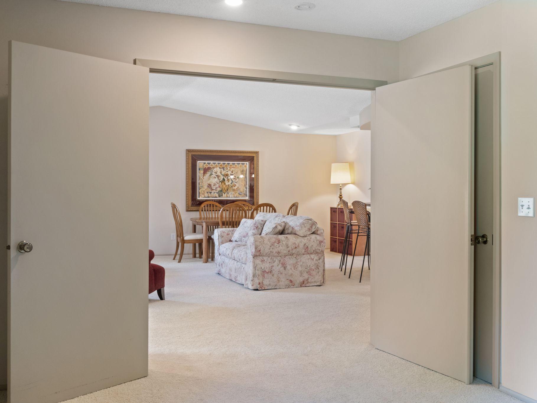 Double doors create privacy for dedicated work space.