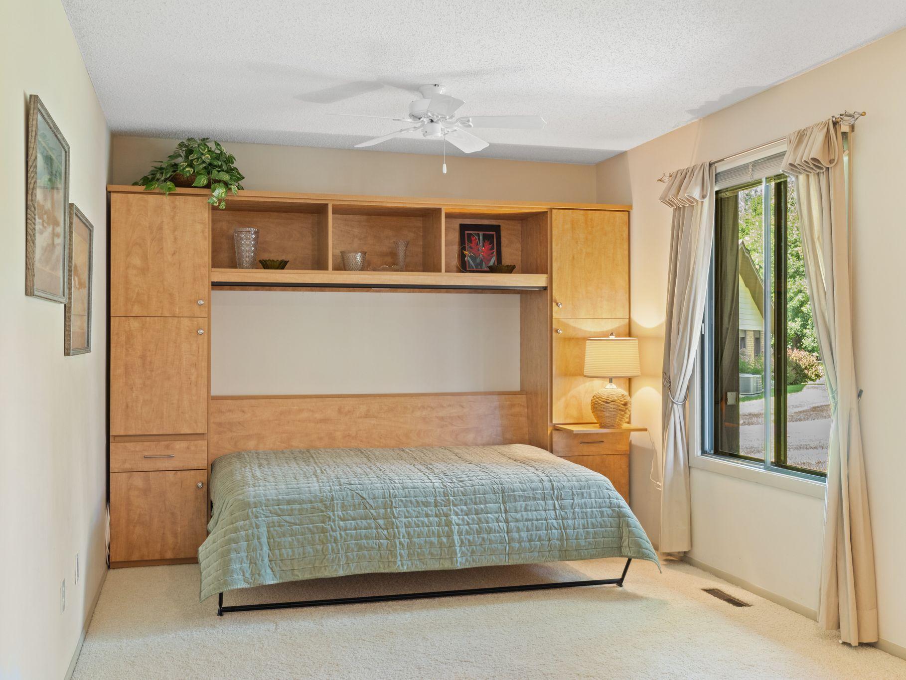 ...Guest bedroom tomorrow! An abundance of storage in the surrounding built-ins allows for an easy transformation.