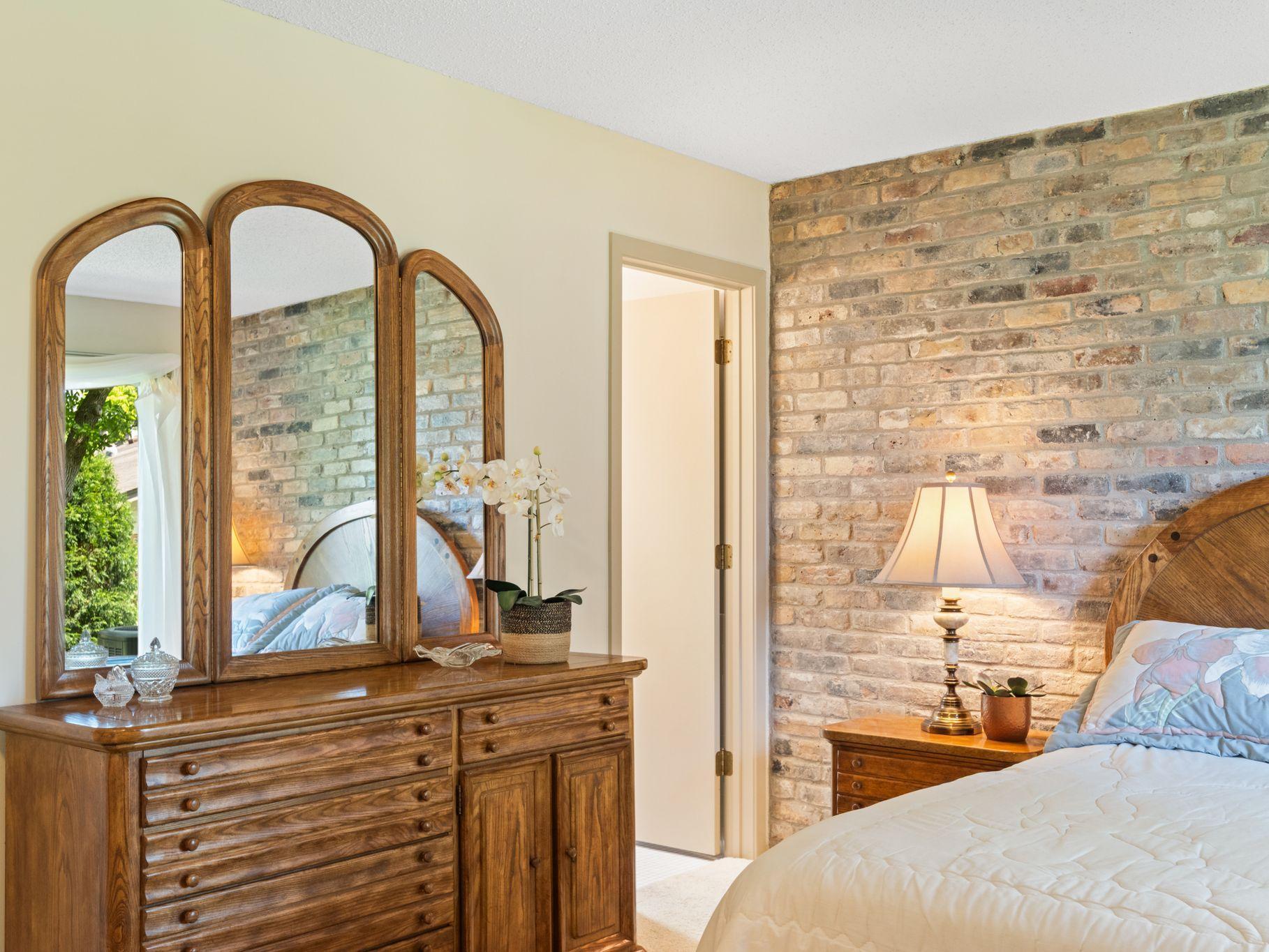 Private 3/4 bath for the primary bedroom is light and bright.