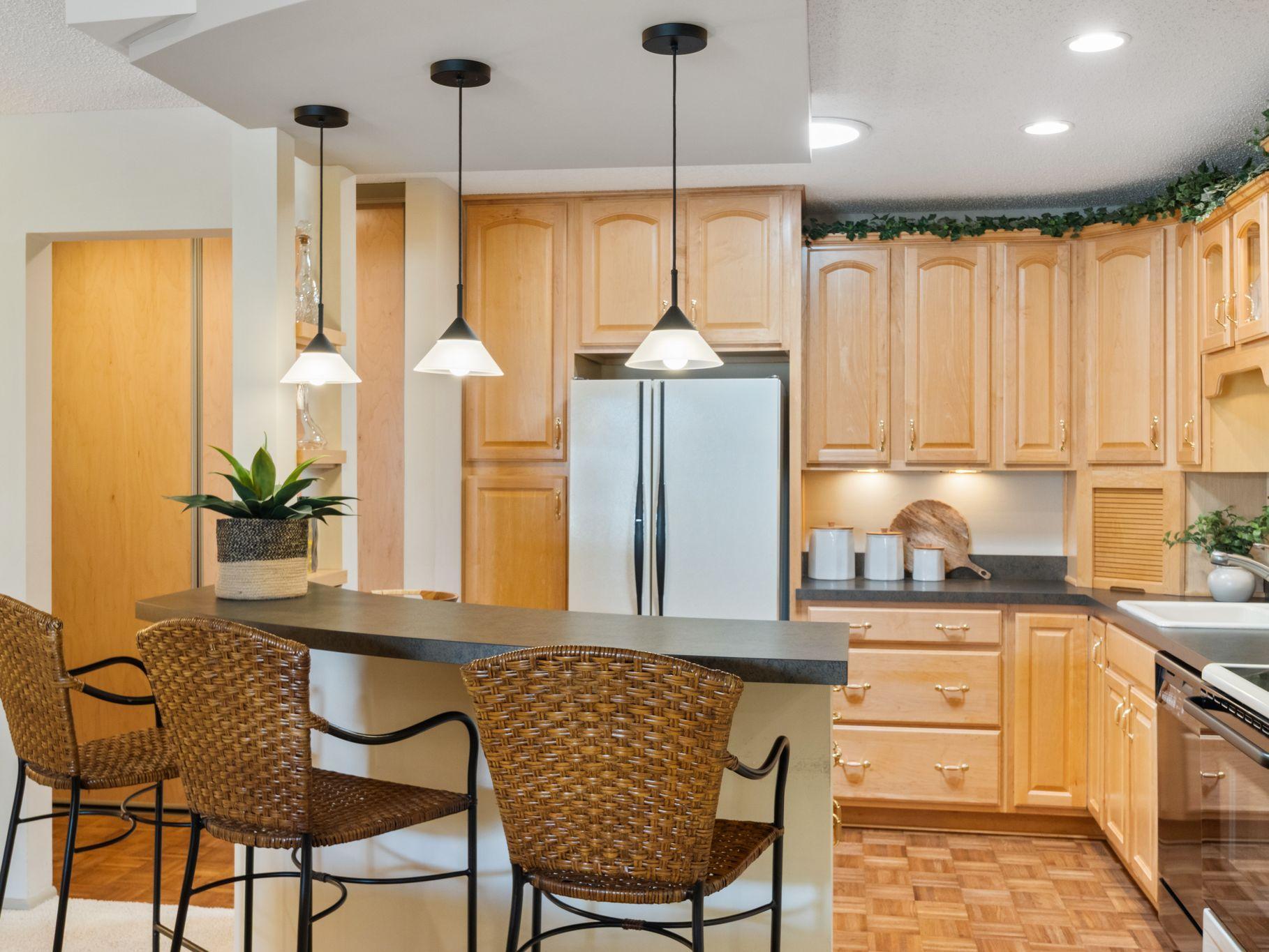 Solatubes in the kitchen and bathrooms bring additional natural light into the home.