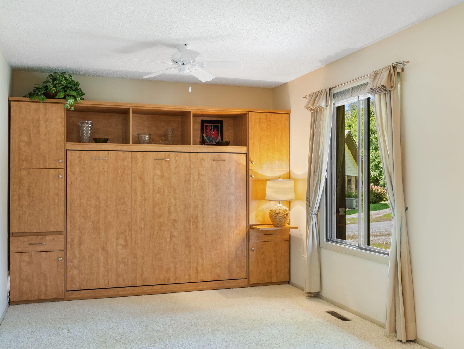Need an office most days and guest room occasionally? The installed Murphy bed transforms the room into comfortable guest accommodations when company arrives. Office today...