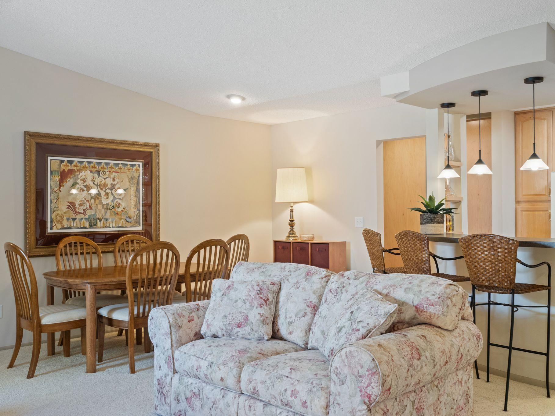 Dining room is adjacent to living room. An open floor plan allows for everyone to be included when entertaining.