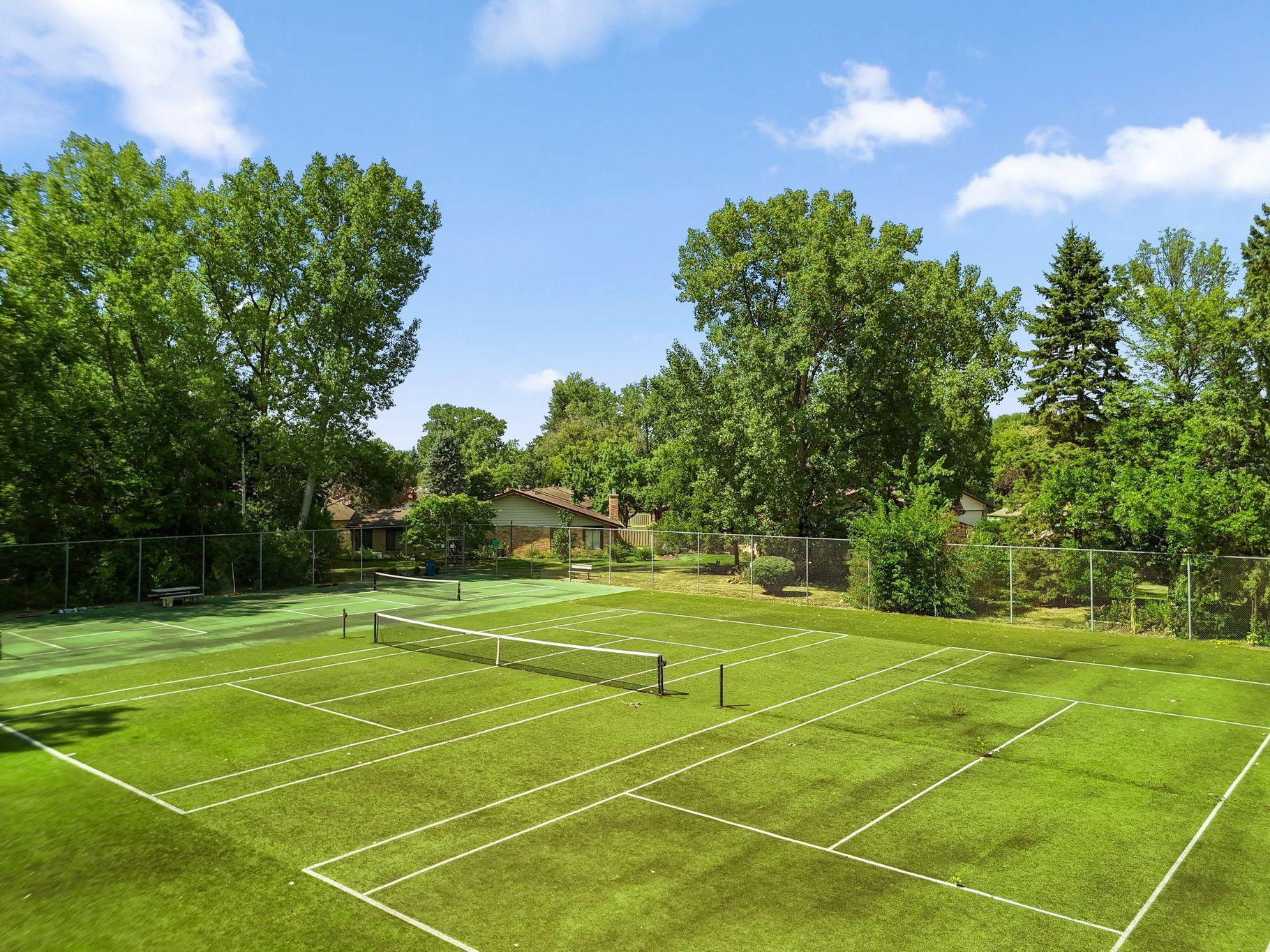 Enjoy mature trees, ponds, & genreous green spaces throughout the neighborhood along with the tennis and pickleball courts. Luce Line Trail access is conveniently located near the entrance. Parker's Lake & Parker's Lake Golf Center are also nearby.