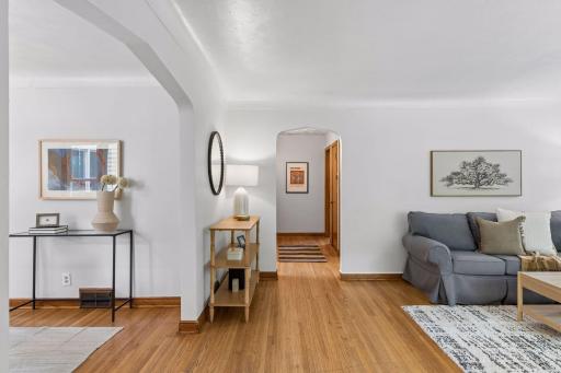 Inviting timeless details; hardwood flooring, arched doorways and coved ceilings!
