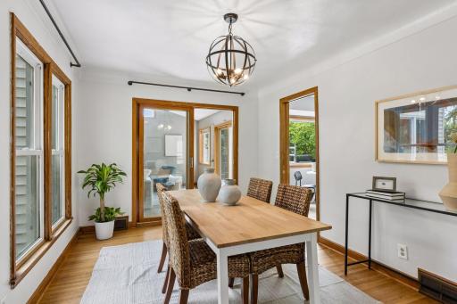 Dining room just off the living room, family room and kitchen.