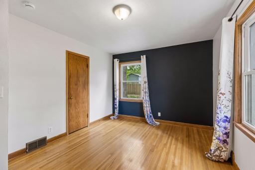 Second of the spacious main floor bedrooms. Newer windows, hardwood flooring!