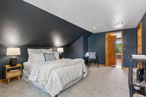 Primary Bedroom - Recessed lighting, new carpet and loads of space and privacy!
