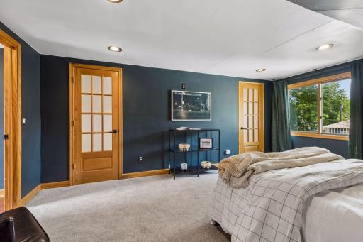 Upper level bedroom towards the walk-in closet.