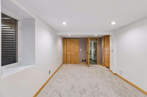 Another view of the spacious lower level bedroom - New Carpeting, Walk-in Closet and 3/4 Bathroom!! Great for guests or extended family!!