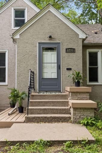 New Storm door. Newer windows and lovely updates inside!