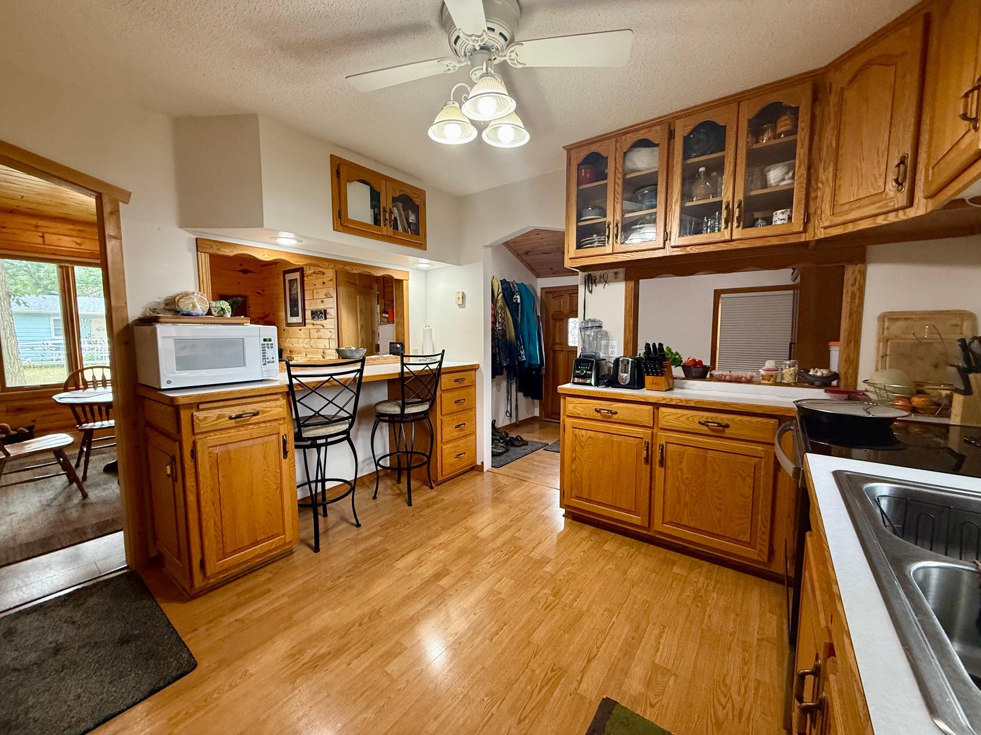 8-Kitchen angle 2 showing opening to dining room.jpeg
