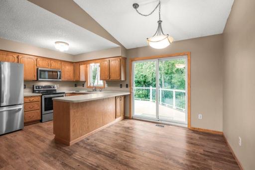 Dining area - open to the kitchen with access to the deck!