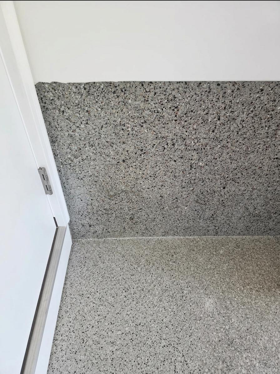 Custom-finished, sealed garage floor and walls.