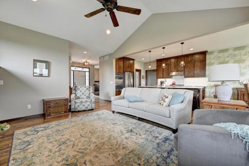 Living room has a vaulted ceiling