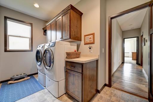 Laundry room with cabinets