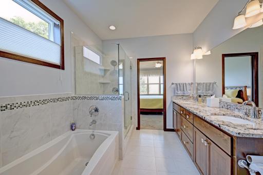 Bathroom suite has a oversized shower and tub