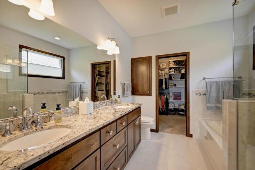 Bathroom suite with double vanity, walk-in closet