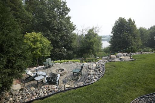 This is the view from the backyard. A pond in the background