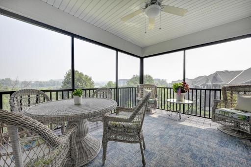 Screen Porch has garden and tree top views