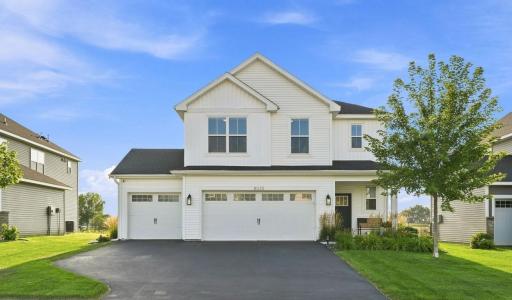 Former model home available to purchase! Backs up to a wetland for privacy.