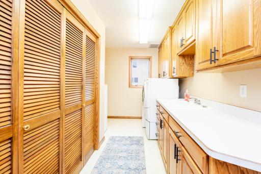 Spacious laundry room with sink