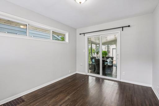 9. 5900 Queen Sitting Room to Porch.jpg