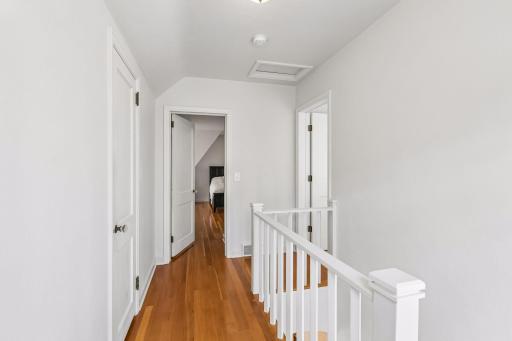 Upper hallway features two closets for excellent storage space.