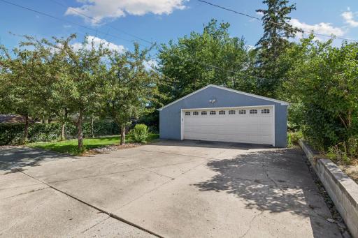 AWESOME! Oversized 2 car garage - almost a 3 car at 26x24 - plus a lane concrete driveway for additional off street parking.