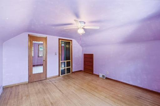 Upstairs Purple bedroom with walk-in closet