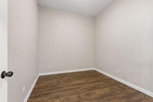 Den/bonus room works well as a home office, non-conforming bedroom, or workout space.