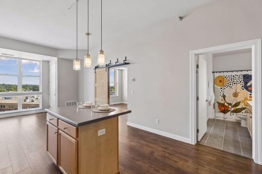 Spacious kitchen includes center island with breakfast bar seating.