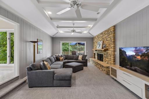 Gas fireplace surrounded by limestone