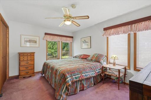 Bedroom on the main level with a walk through to the main floor bathroom
