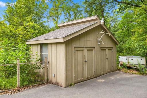 Large storage shed. Perfect for all of your outdoor tools!