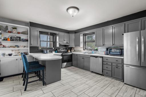 Newer stainless steel appliances and flooring
