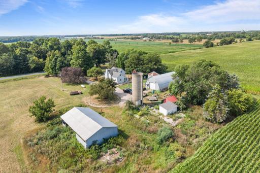 3 quiet country acres with established outbuildings