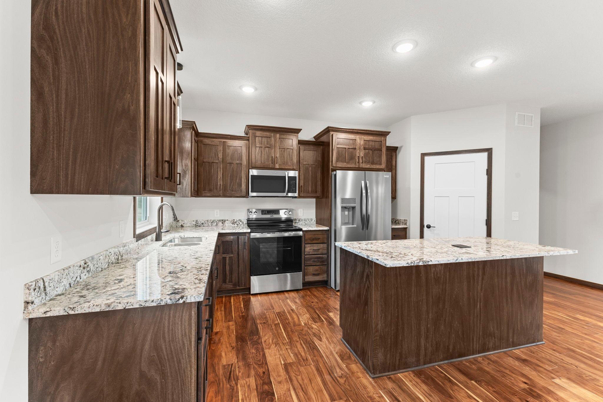 Sleek, stainless steel appliances are included