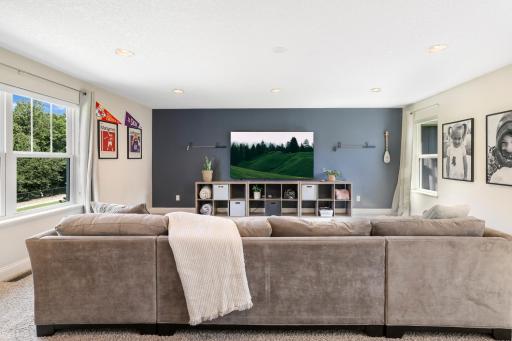 Huge upper-level bonus room - perfect for movie nights, a game room, or a secondary living space.