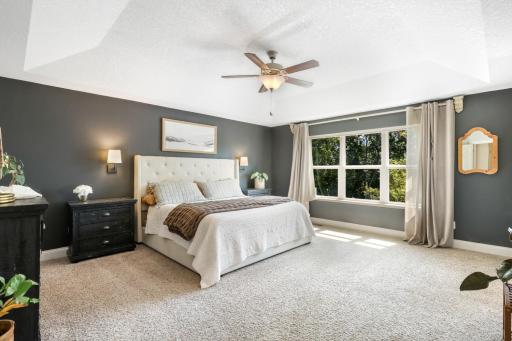 Luxurious primary suite offering a private, light-filled sanctuary.
