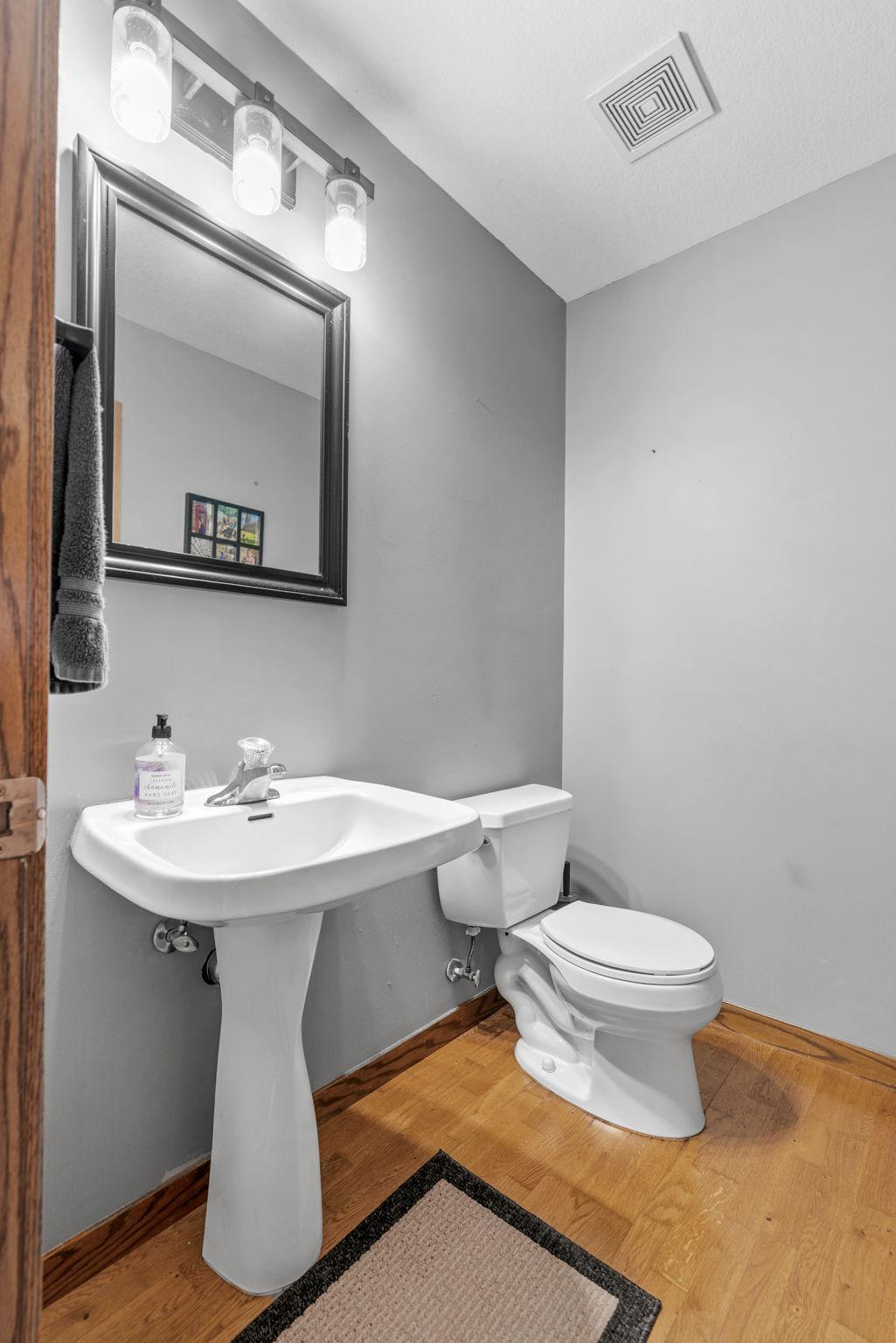 Main Floor Half Bath off the mudroom and kitchen