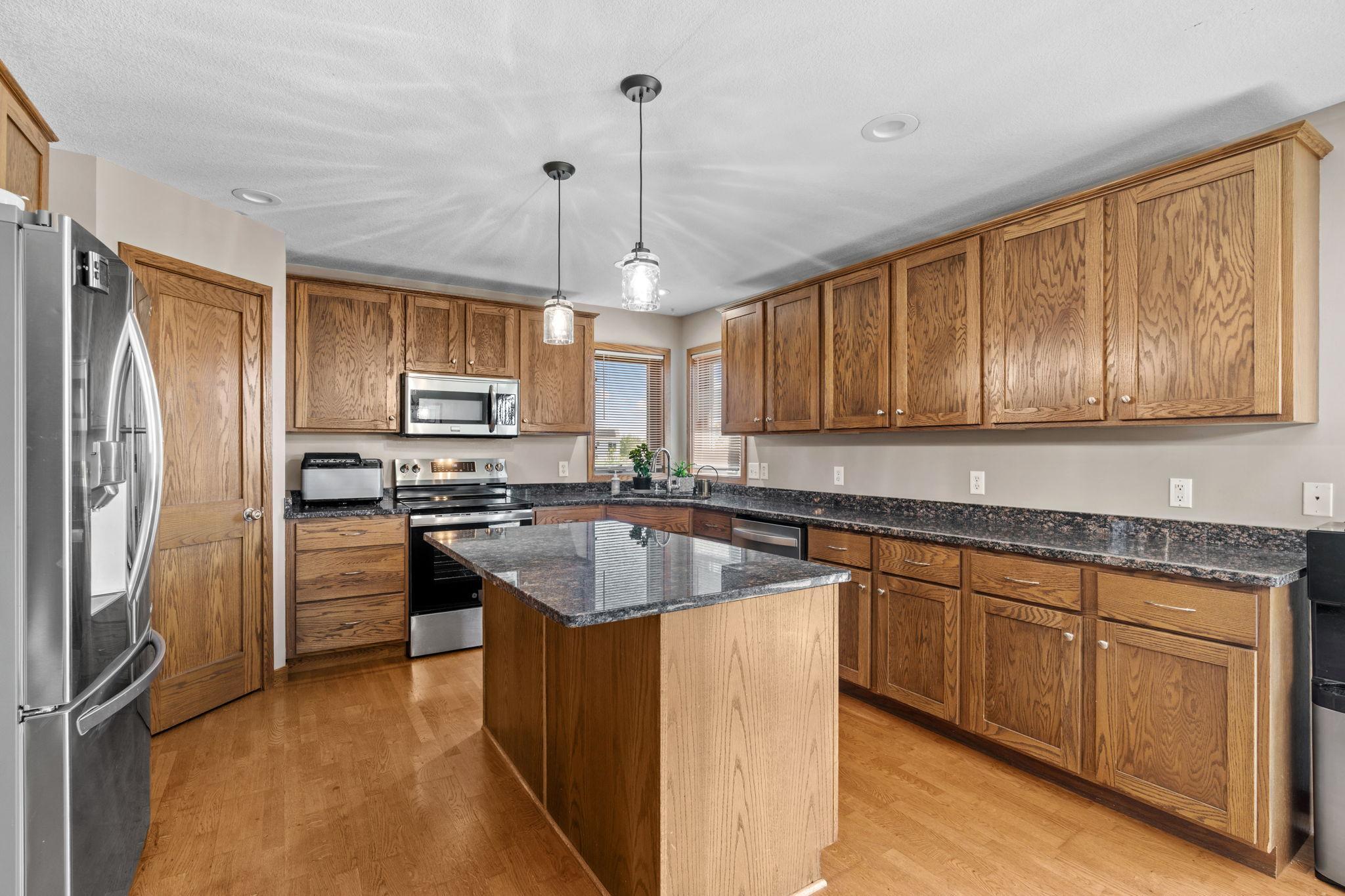 Granite countertops, stainless steel appliances